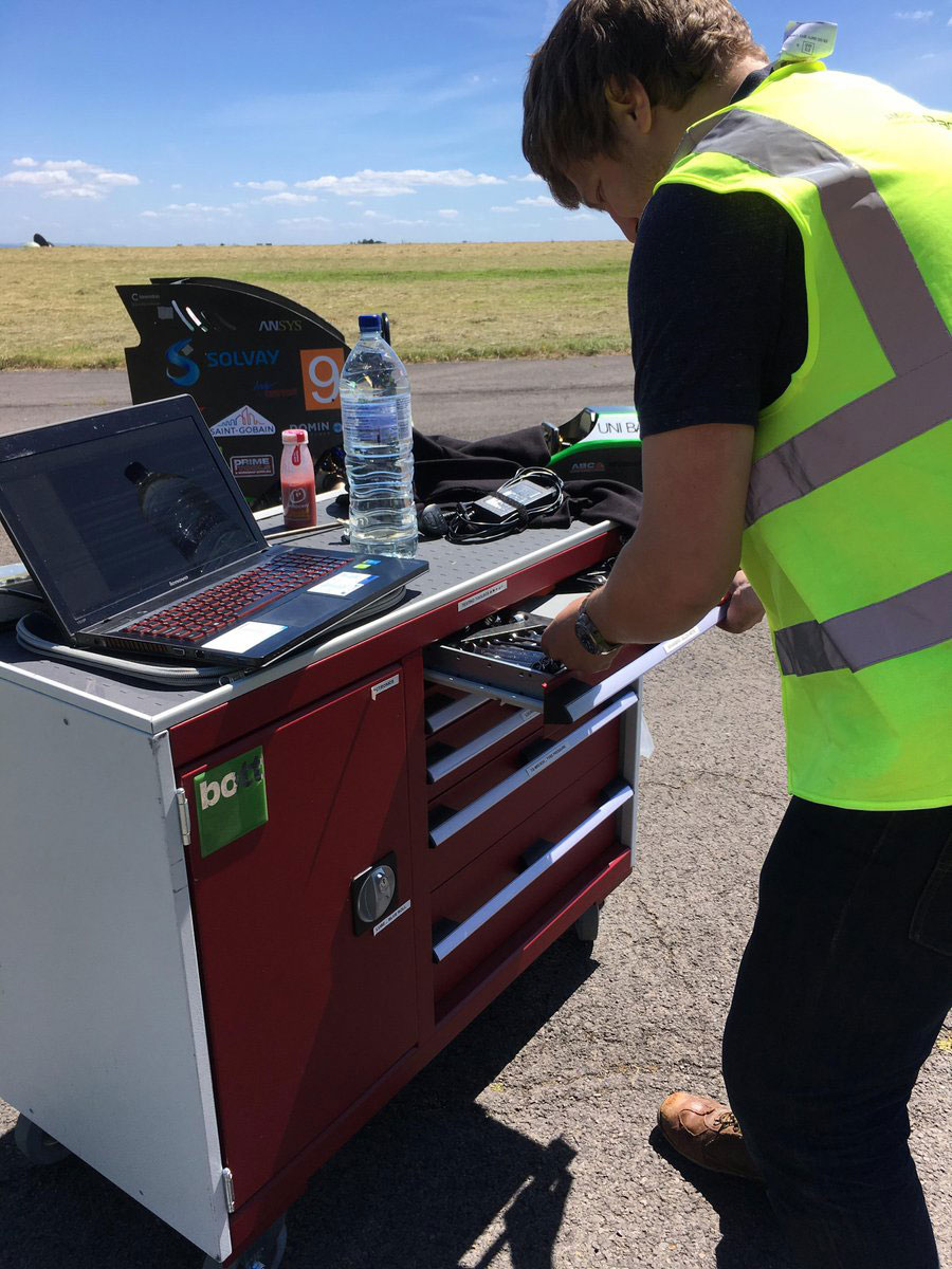 red bott tool trolley trackside at formula student race